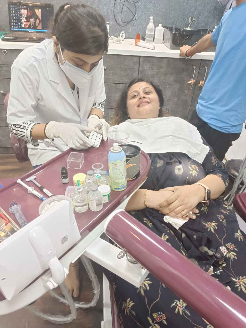 Dr. Surbhi, best dentist in gwalior doing treatment of her patient with care